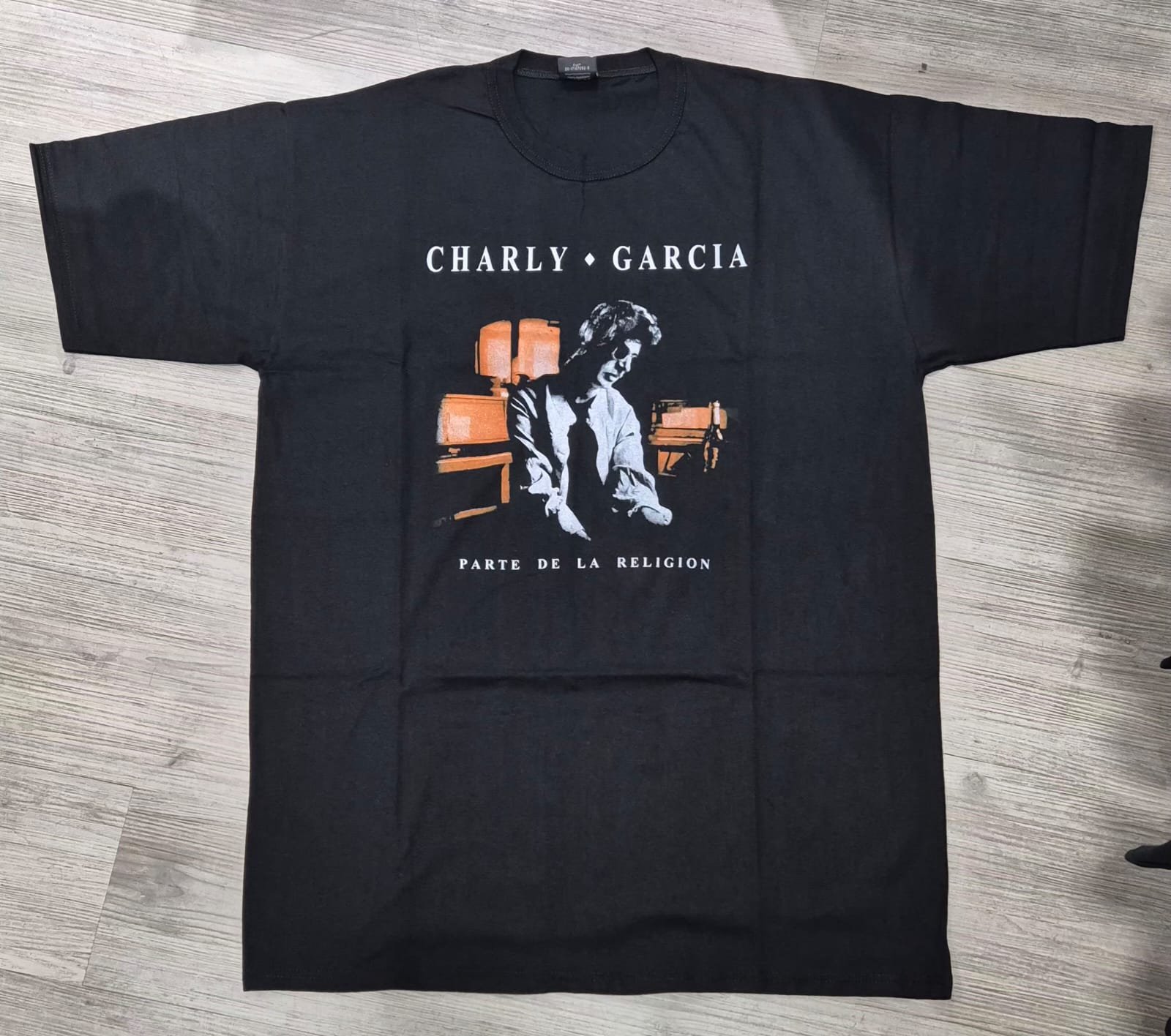 REMERA CHARLY- PARTE DE LA RELIGION